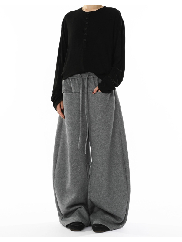 Pantaloni casual cu croială largă, talie medie și închidere cu șnur, material poliester 90%, ușoară elasticitate — lansare toamna 2025