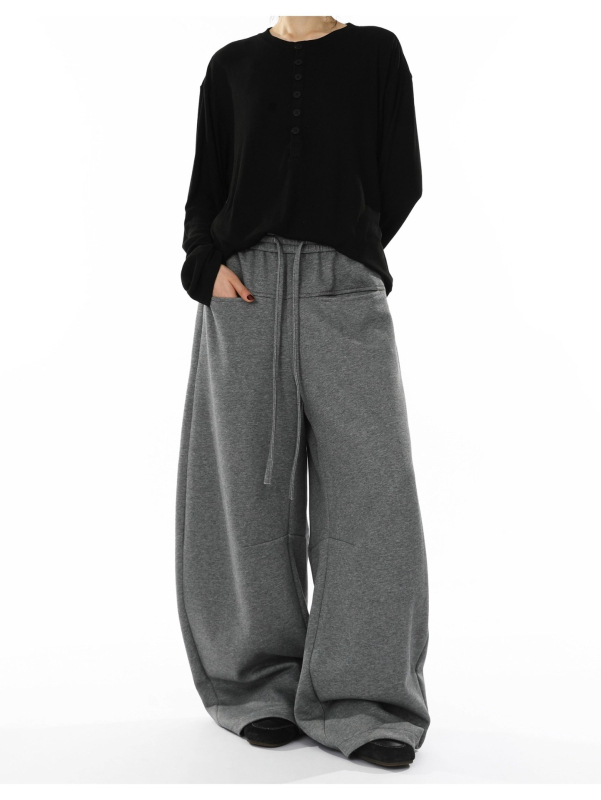 Pantaloni casual cu croială largă, talie medie și închidere cu șnur, material poliester 90%, ușoară elasticitate — lansare toamna 2025