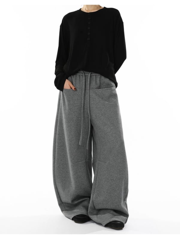 Pantaloni casual cu croială largă, talie medie și închidere cu șnur, material poliester 90%, ușoară elasticitate — lansare toamna 2025