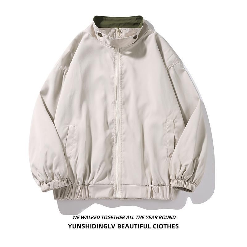 Sportska jakna sa stojećim ovratnikom i kapuljom, slobodan kroj, dugi rukavi