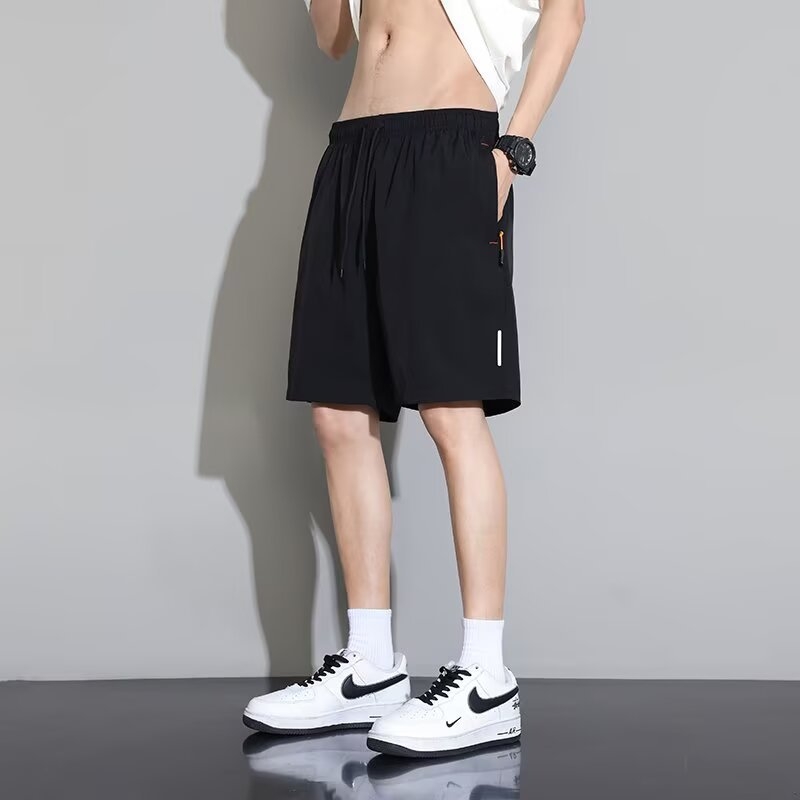 Pánske športové šortky z polyesteru, voľný rovný strih, dĺžka 3/4, letný ľahký materiál