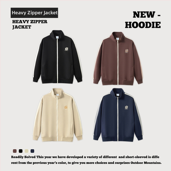 Õhku läbilaskev puuvillane jak, tõmblukuga, püstise kaelaga, vaba lõige ja pikkade varrukatega.