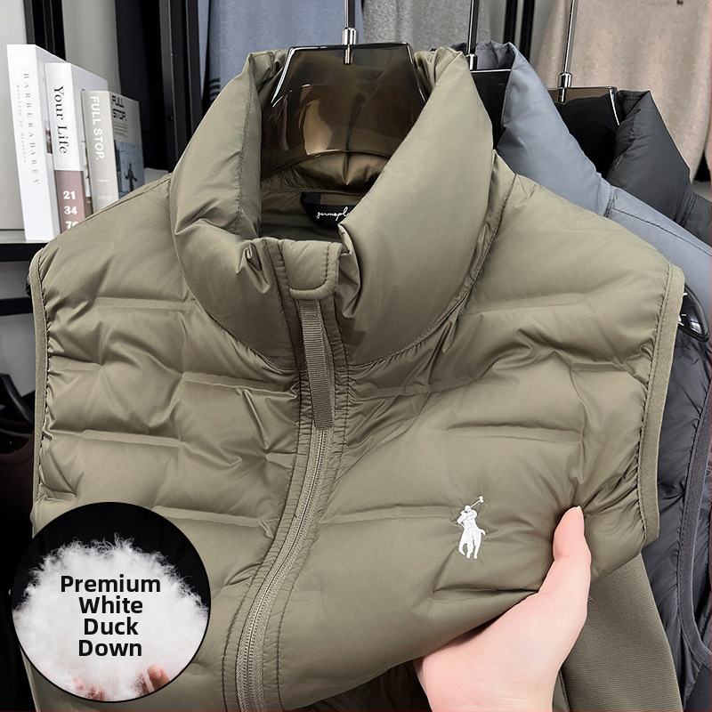 Vesta s perovou výplňou, stojací golier, predný zips, kapsy na zips, zimné nosenie