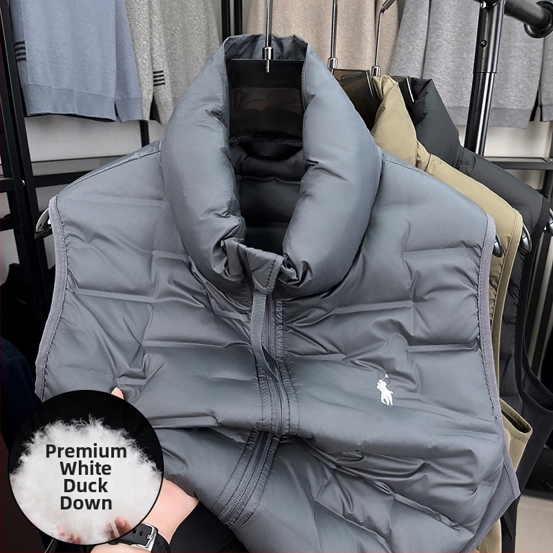 Vesta s perovou výplňou, stojací golier, predný zips, kapsy na zips, zimné nosenie