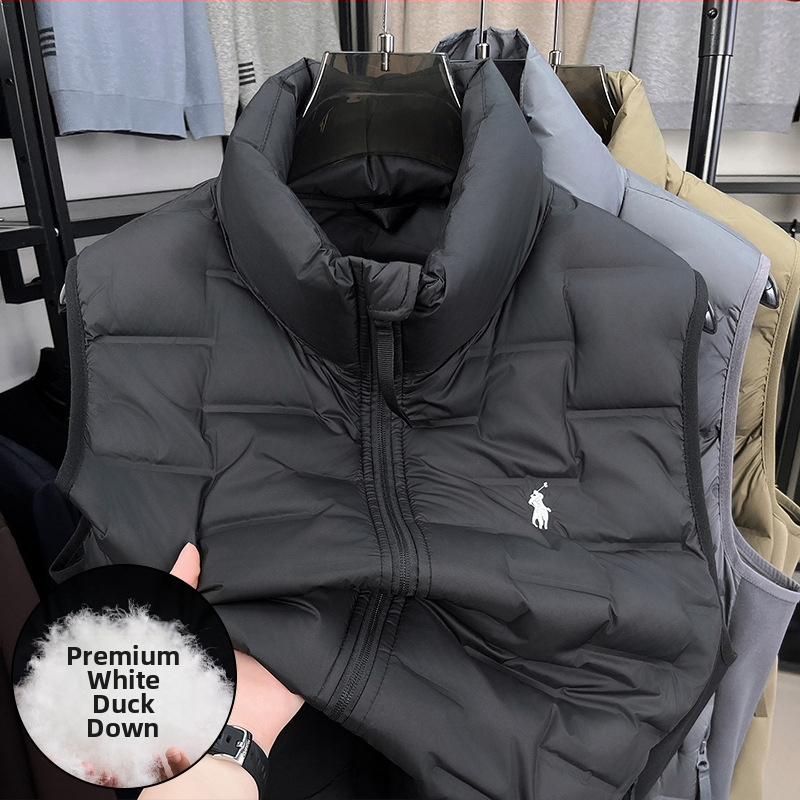 Vesta s perovou výplňou, stojací golier, predný zips, kapsy na zips, zimné nosenie