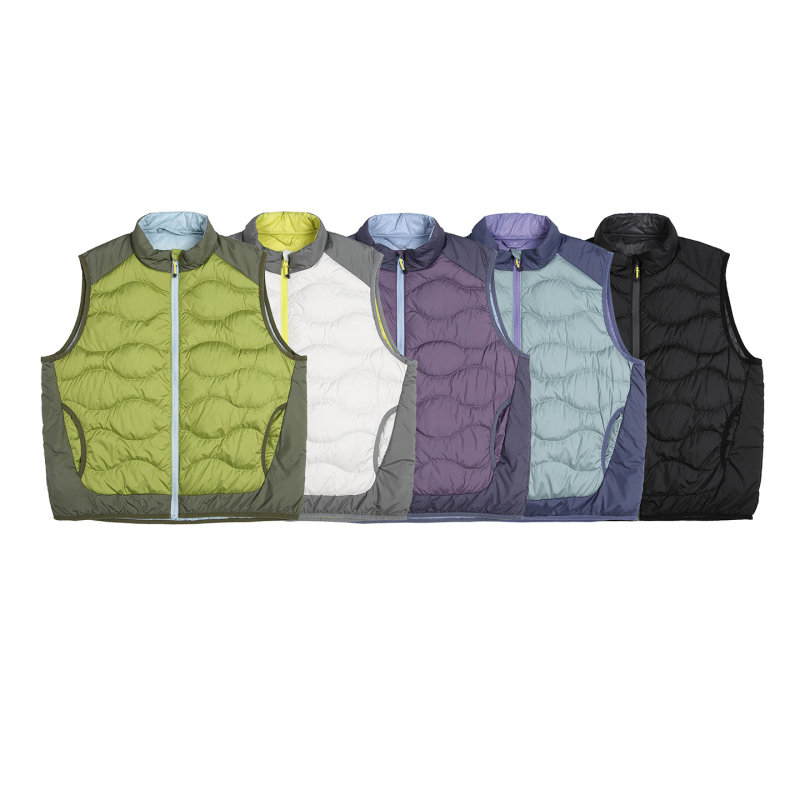 Унисекс лека пухена жилетка с дизайн на блокове, съдържание пух 91–95%, запълване 30–55 g, външен материал полиестер 100%, подплата найлон, за зимния сезон