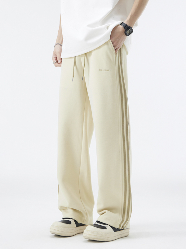 Pánske tepláky s fleecovou podšívkou, rovným strihom, dlhé, stredný pás, zmes bavlny a polyesteru 60/40, americký retro štýl.