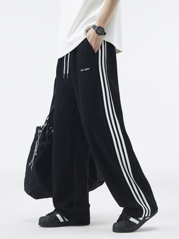 Pánske tepláky s fleecovou podšívkou, rovným strihom, dlhé, stredný pás, zmes bavlny a polyesteru 60/40, americký retro štýl.