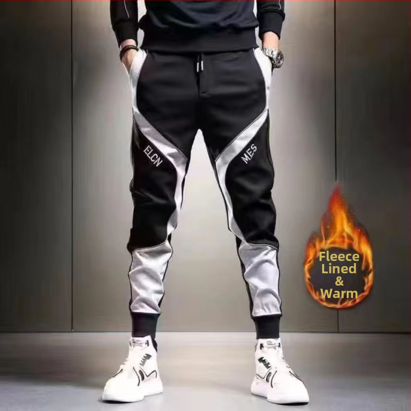 Pánske športové pracovné nohavice, voľného strihu, stredný pás, šnúrka na stiahnutie, polyesterová zmes