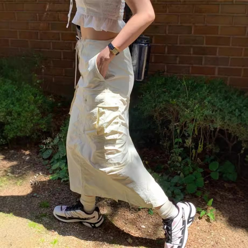 Suknja u stilu kombinezona, najlon-spandeks smjesa, osam džepova, srednja duljina, mikroelastična