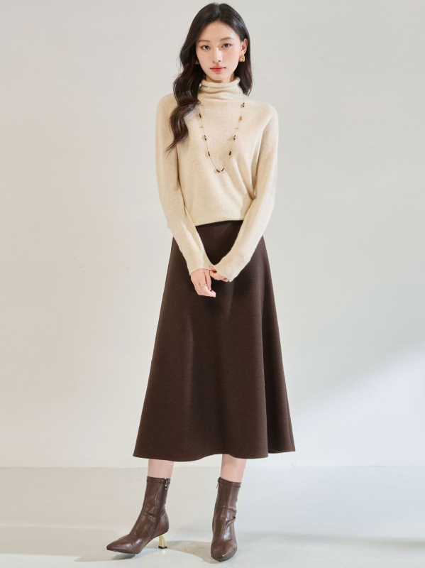 A-образна миди пола от смес полиестер и вискоза (70–80% полиестер, вискоза под 30%), едноцветна, леко разтягане, елегантен офис стил.