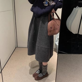 Vunena A-linijska midi suknja s abstraktnim kolaznim uzorkom