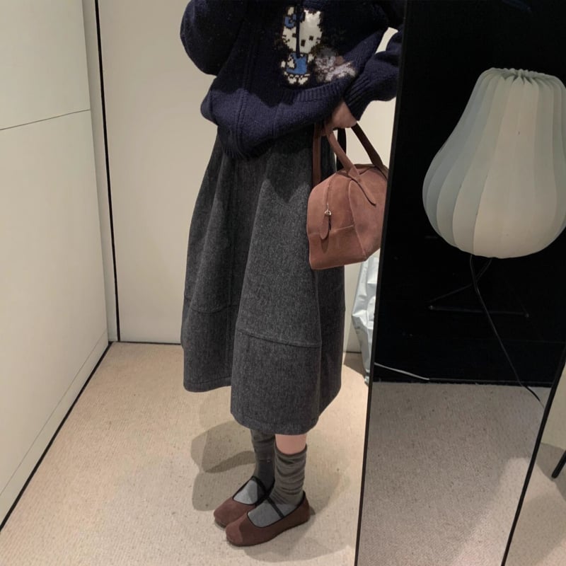 Vunena A-linijska midi suknja s abstraktnim kolaznim uzorkom