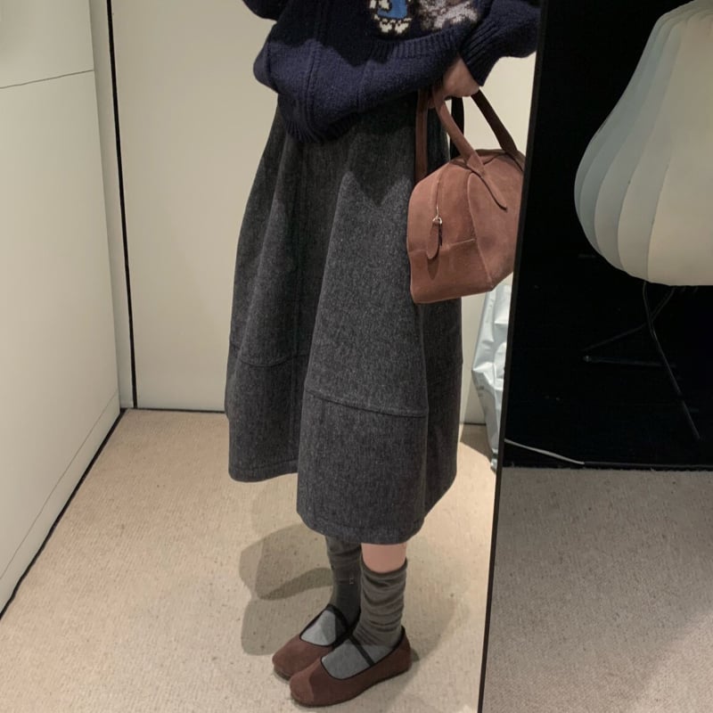 Vunena A-linijska midi suknja s abstraktnim kolaznim uzorkom