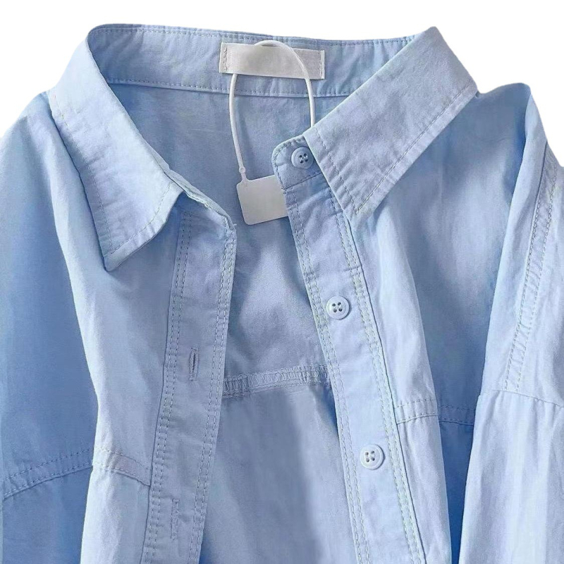 Памучна риза с поло яка, дълги ръкави, свободна кройка, средна дължина, джобове, копчета