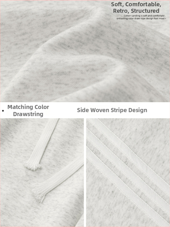 Texturované voľno strihané športové nohavice s bočnými pruhmi, voľné, stredný pás, šnúrkové zapínanie, zmes bavlny a polyesteru