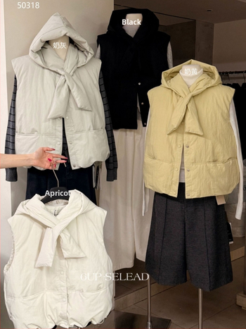 Vesta s V-krkom, vonkajší nylon, výplň z páperia 86–90%, hrubá, dĺžka 50–65 cm