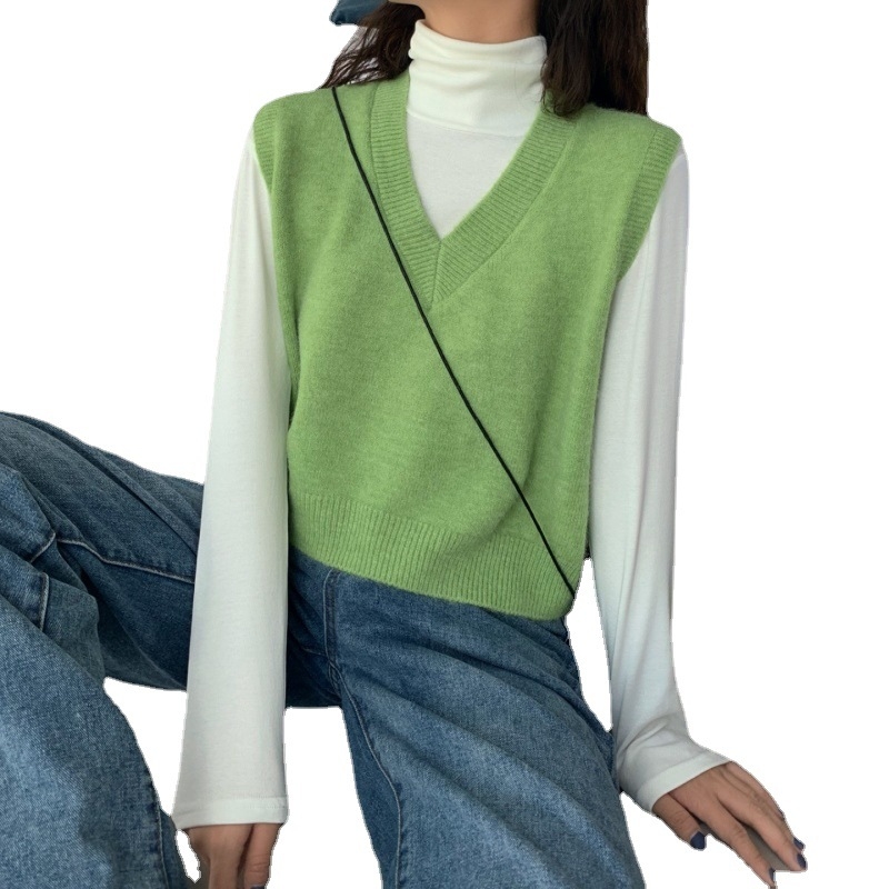 Dámska bezrukávová vesta s V-krkom - pletená, vlneno-viskozová zmes, jednofarebná, dĺžka 50–65 cm