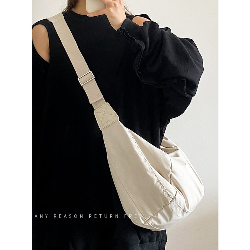 Női crossbody táska dumpling stílusban, pamut anyag, cipzár, poliészter bélés, egy vállpánt