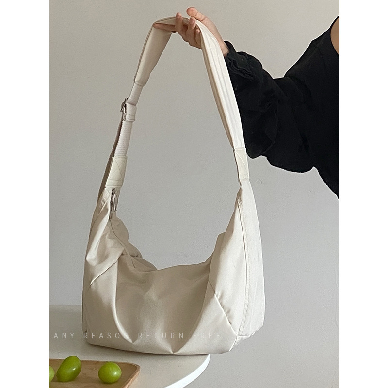 Női crossbody táska dumpling stílusban, pamut anyag, cipzár, poliészter bélés, egy vállpánt