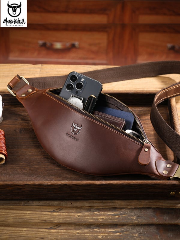 Vyriska odinė juosmens rankinė Cow Captain Leather — viršutinio sluoksnio jautienos oda, atspari vandeniui, dėvėjimuisi atspari, vienos spalvos raštas, poliesterio padas