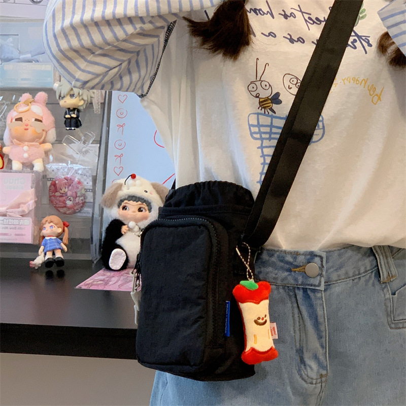 Nylonová cez rameno taška na telefón pre voľný čas a cestovanie, so zipsom a vnútornými priečinkami