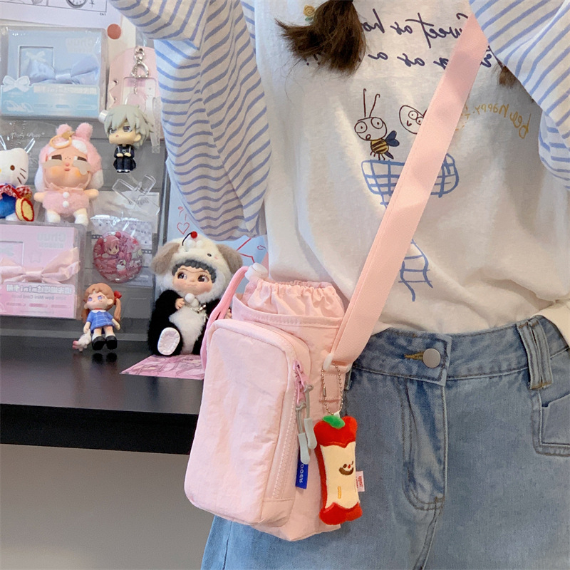 Nylonová cez rameno taška na telefón pre voľný čas a cestovanie, so zipsom a vnútornými priečinkami