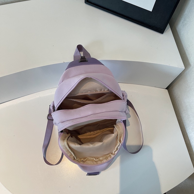 Rucsac portabil multifuncțional cu stil street fashion; Material: pânză; Închidere cu fermoar; Căptușeală poliester; Buzunare interne pentru telefon și card de identitate (Vara 2025)