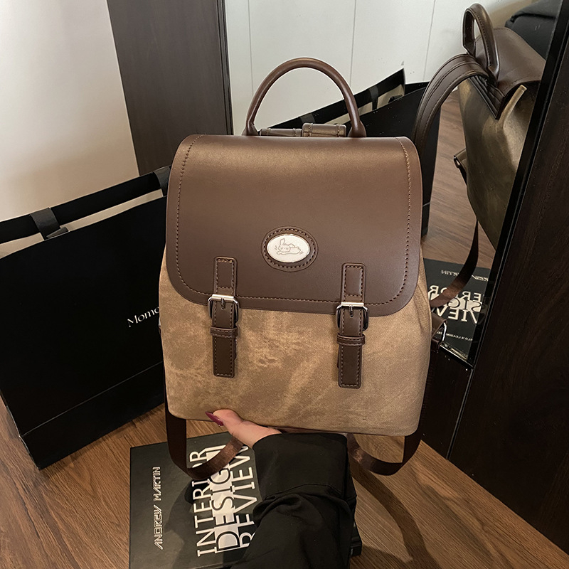 PU ranac s preklopom, unutarnji pretinci za telefon i dokumente, otporan na habanje i protiv krađe