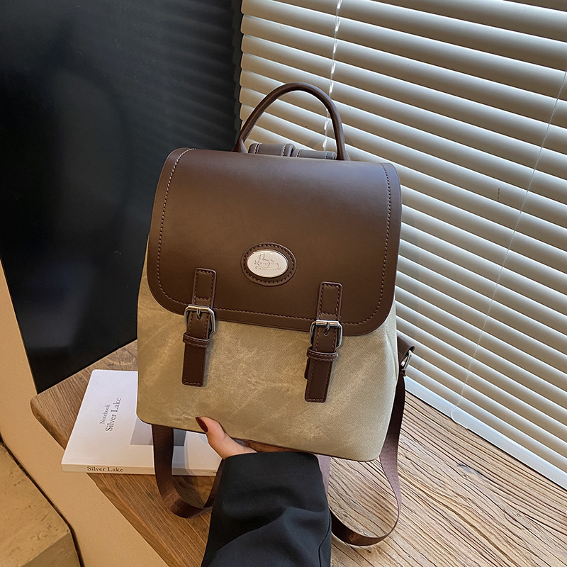 PU ranac s preklopom, unutarnji pretinci za telefon i dokumente, otporan na habanje i protiv krađe