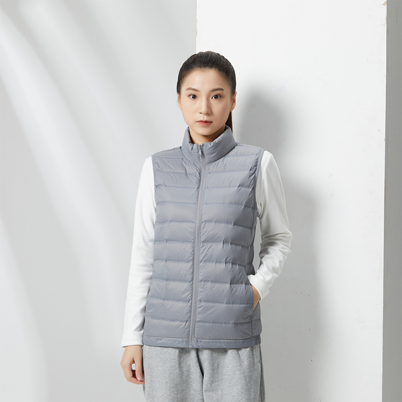 Unisex vesta s páperím, ľahká, výplň 90% páperie, stojací golier, zips, nylonová látka