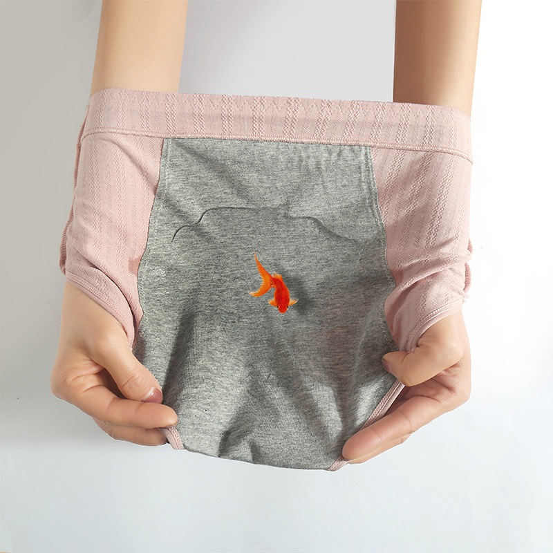 Moteriški aukšto juosmens medvilniniai periodiniai apatiniai, kvėpuojantys; priekyje ir gale apsauga nuo nutekėjimų; pagrindinis audinys 95% medvilnė, tarpkojo įdaila 90% medvilnė