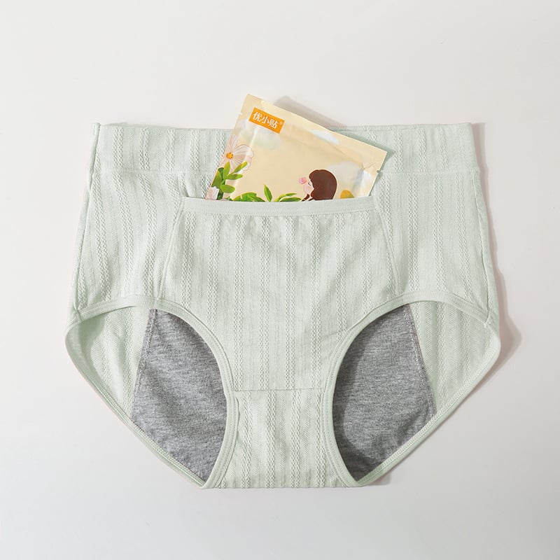 Moteriški aukšto juosmens medvilniniai periodiniai apatiniai, kvėpuojantys; priekyje ir gale apsauga nuo nutekėjimų; pagrindinis audinys 95% medvilnė, tarpkojo įdaila 90% medvilnė