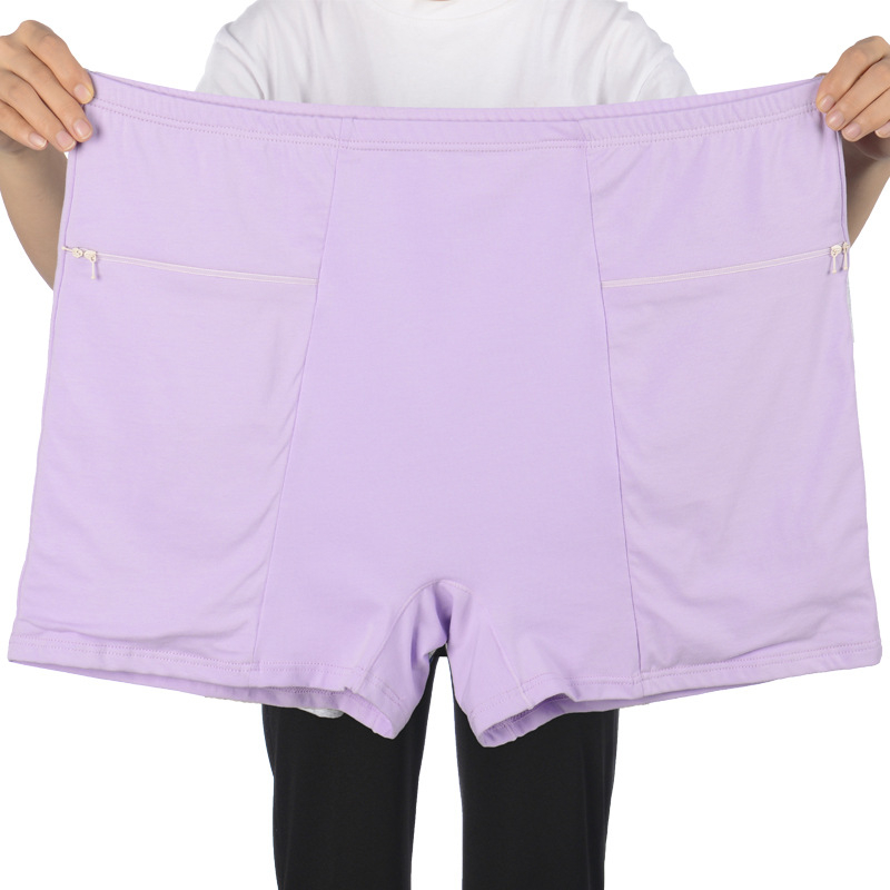 Dámske bavlnené nohavičky s vysokým pásom, dvojitými vreckami a dvojitými zipsami; priedušné.