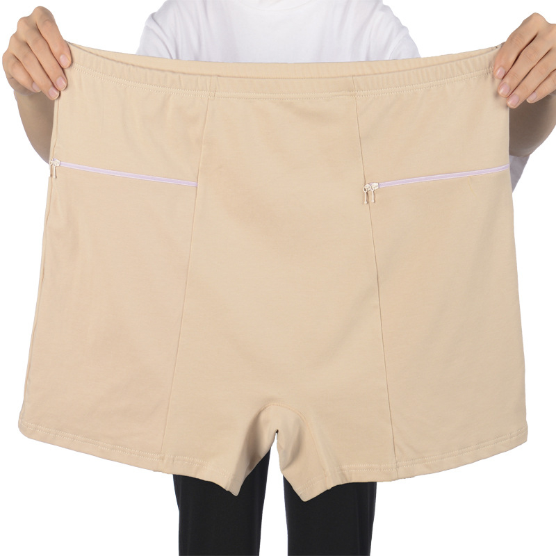 Dámske bavlnené nohavičky s vysokým pásom, dvojitými vreckami a dvojitými zipsami; priedušné.