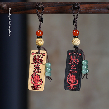 Ebeno puidust võtmehoidja graveeritud sümboliga – unisex telefoni ripats, paaristiil