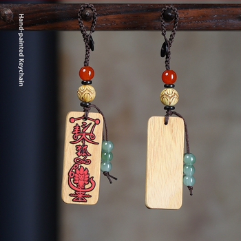 Ebeno puidust võtmehoidja graveeritud sümboliga – unisex telefoni ripats, paaristiil