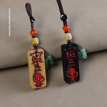 Ebeno puidust võtmehoidja graveeritud sümboliga – unisex telefoni ripats, paaristiil