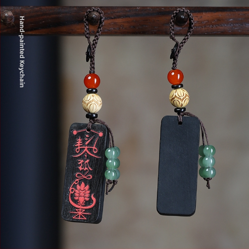 Ebeno puidust võtmehoidja graveeritud sümboliga – unisex telefoni ripats, paaristiil