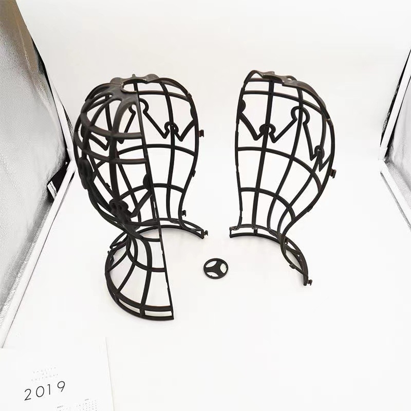 Stojan na parochne so dvojdielnou hlavou formou a dvojdielnym rámom na uloženie, zavesenie a sušenie parochní a klobúkov