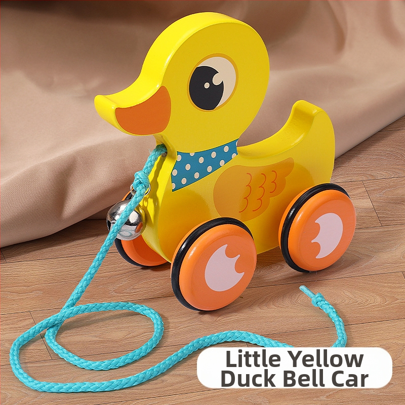 Drevená ťahacia chodítko hračka pre deti 4–6 rokov s motívom kresleného zvieraťa; materiál: drevo; značka: Big hand in small hand; rozvíja koordináciu ruka-oko