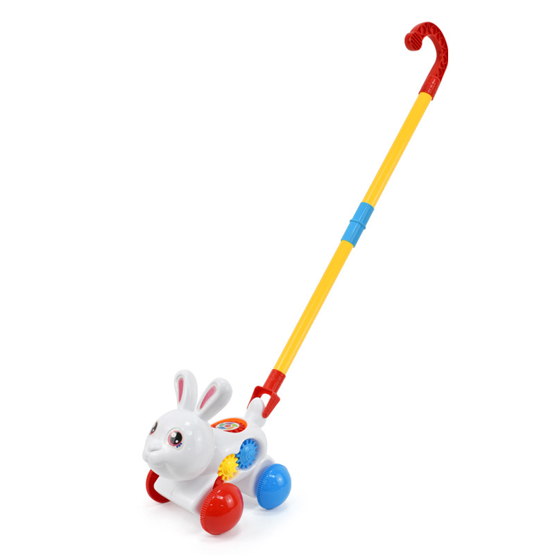 Detská ťahacia hračka s figúrkami zvierat (pterozaur, krab, chrobák, zajačik) — z plastu, s jednou tyčou, hudobný zvonček, hojdať sa a otáčať sa