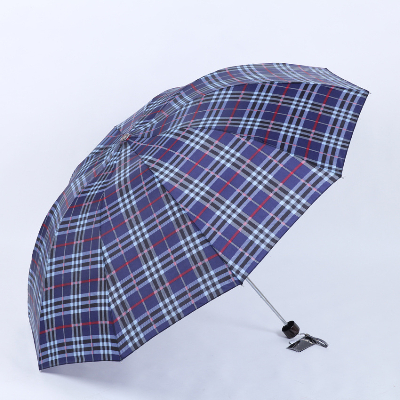 Paradise dáždnik: trojskladaný kockovaný vzor, 10 oceľových lúčov, látka z polyesteru 210T, ručné otváranie, UPF >40