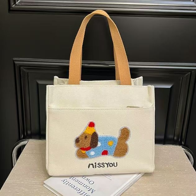 Kangas lõunasöögikott taksikoera motiiviga, suur maht, tõmblukk, polüestervooder, võileivasektsioon, kahekordsed õlarihmad