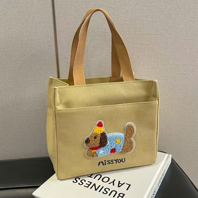 Kangas lõunasöögikott taksikoera motiiviga, suur maht, tõmblukk, polüestervooder, võileivasektsioon, kahekordsed õlarihmad