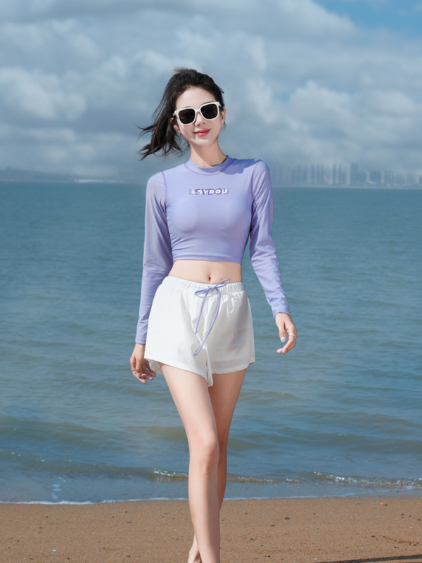 Ženský športový dvoundielny plavky s dlhými rukávmi, konzervatívny strih, vložky na prsia bez kovovej podpory; polyester 88%, podšívka 100%; jednofarebný dizajn; vhodné na plávanie a tréning.