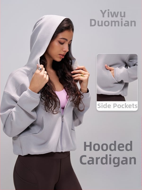 Moteriški su kapuču sportinis viršus pavasario–rudens, joga, ilgomis rankovėmis, užtrauktukas, be pamušalo, modalinis-sintetinis audinys (40% modal, 52% poliesteris, 8% spandeksas)