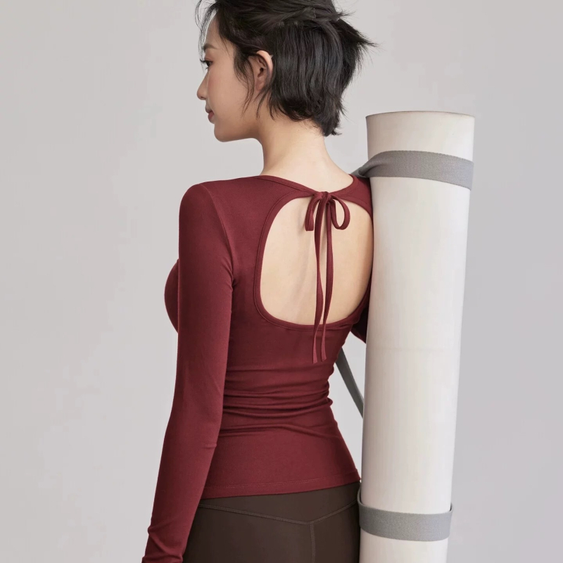 Joga viršūnė su atvira nugara ir virvelinėmis petnešomis, su krūtinės pagalvėle, kvėpuojantis Nailono-Spandekso pluoštas, ilgomis rankovėmis, įprastas ilgis