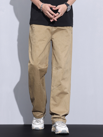 Plašas kokvilnas bikses ar vidējo jostas vietu, taisnais griezums, rāvējslēdzējs priekšā