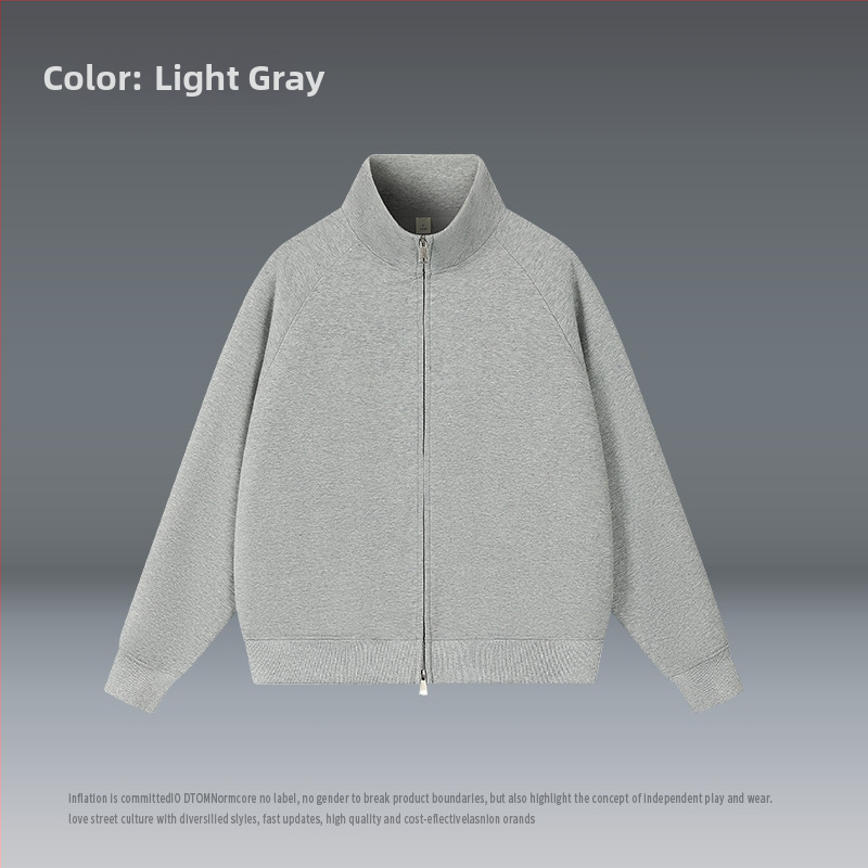 Kardigán álló gallérral, cipzárral, laza szabású, poliészter 51–70%.